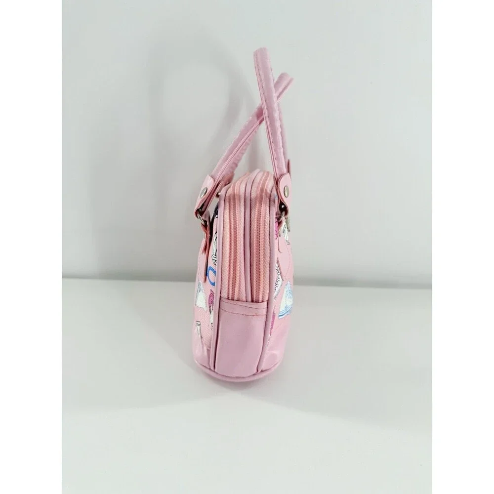 HCC Small/Mini Handbag pink with a print of sneakers, cameras, & cassette tapes